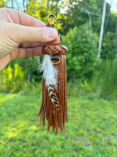 Load image into Gallery viewer, Handmade 8 1/2" cowhide leather tassel with bag charm clip
