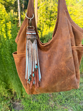 Load image into Gallery viewer, Handmade Natural Hair on Hide Leather Clip Tassel
