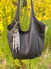 Load image into Gallery viewer, Handmade Natural Black and White Hair on Hide Leather Clip Tassel
