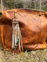 Load image into Gallery viewer, Handmade Natural Hair on Hide Leather Clip Tassel

