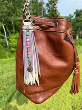 Load image into Gallery viewer, Handmade Leather Clip Tassel, Bone and Purple Sparkle
