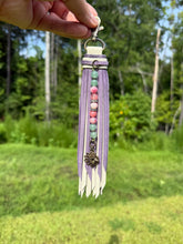 Load image into Gallery viewer, Handmade Leather Clip Tassel, Bone and Purple Sparkle
